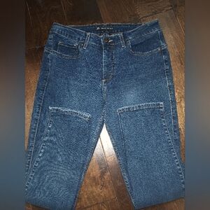 Women's Lee riders shape illusion slim fit mid-rise skinny ankle blue jeans.